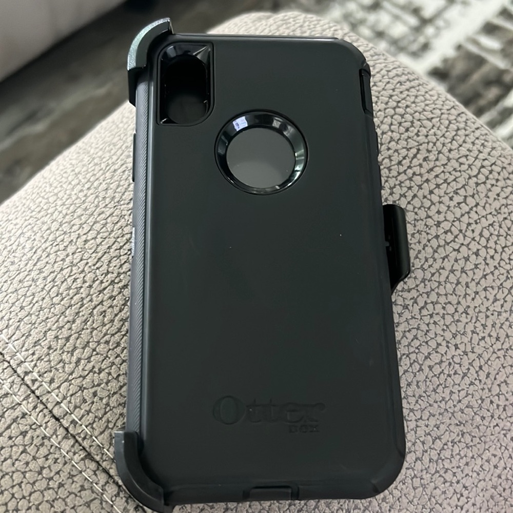 Black iPhone XS OtterBox with clip